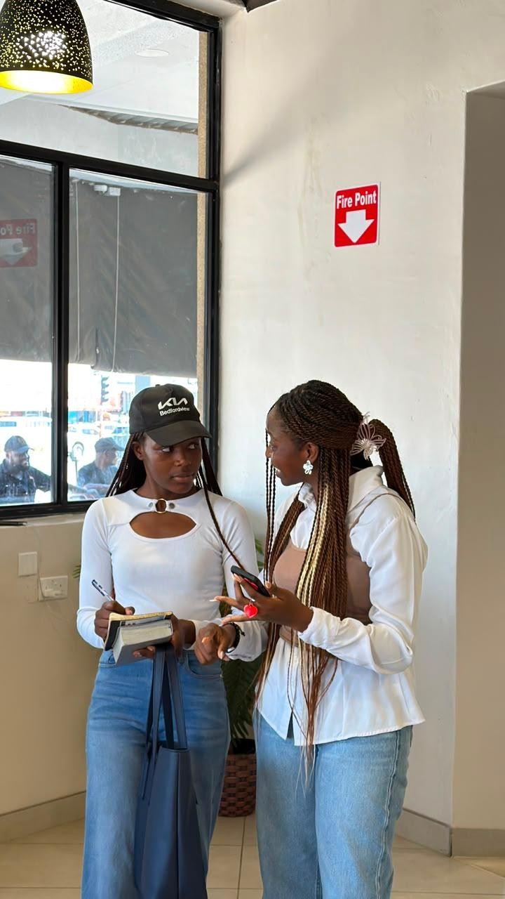 Friends wearing GODNATION-inspired streetwear